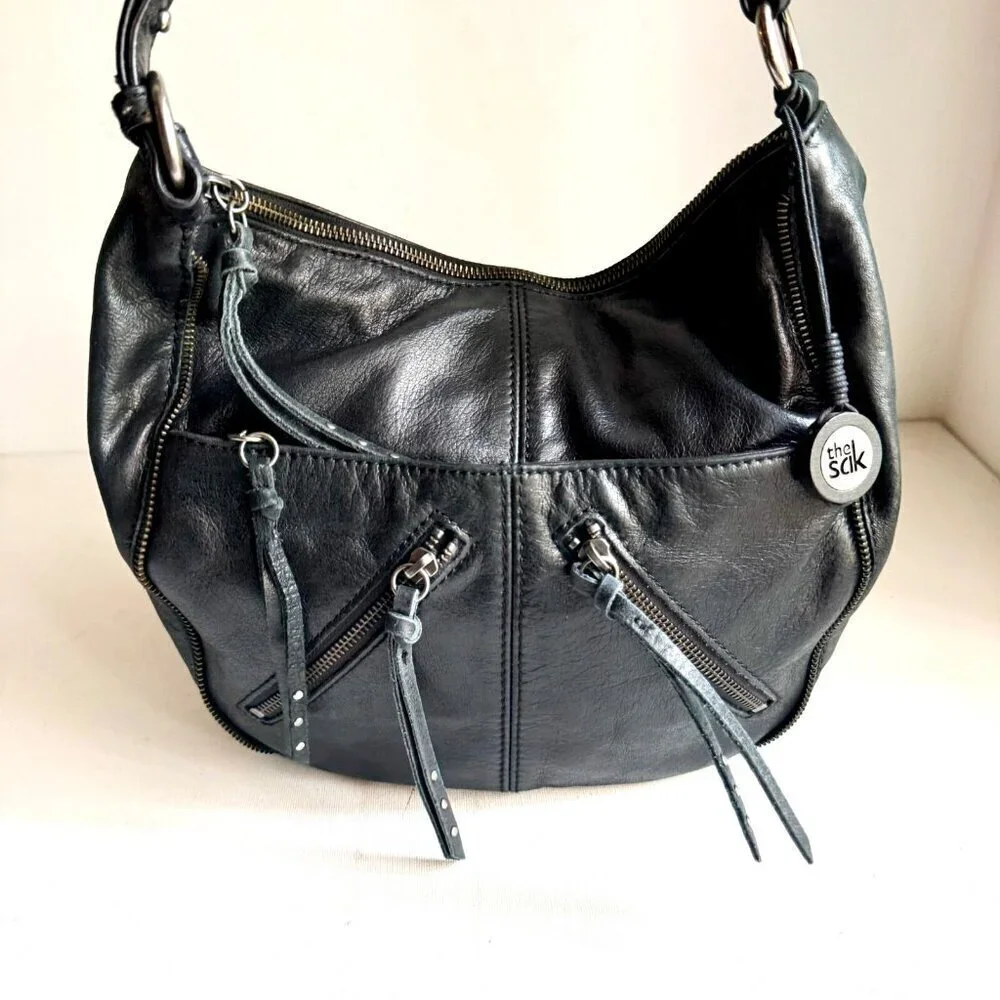 The Sak Black leather Zipper pocket Detail Oval Shoulder Bag